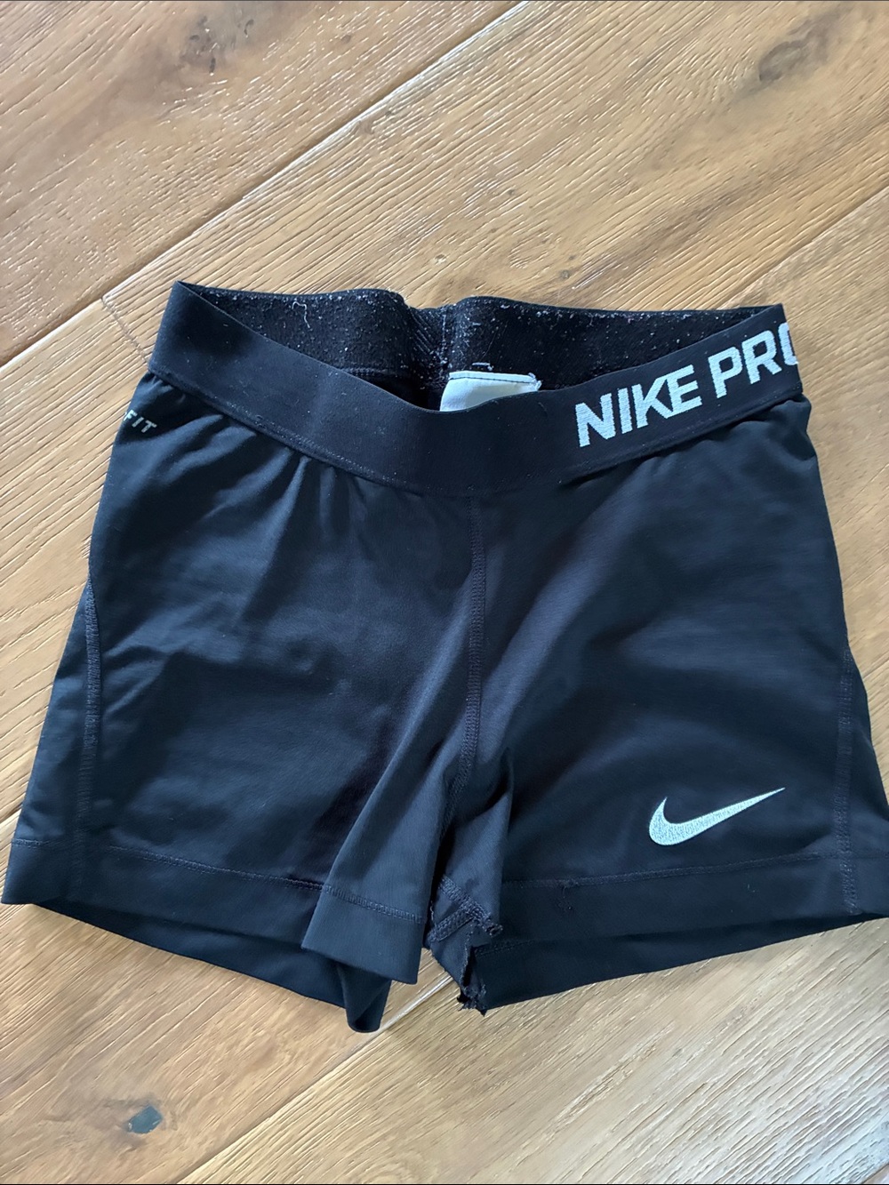 Nike Black Girls' Athletic Shorts with White Swoosh